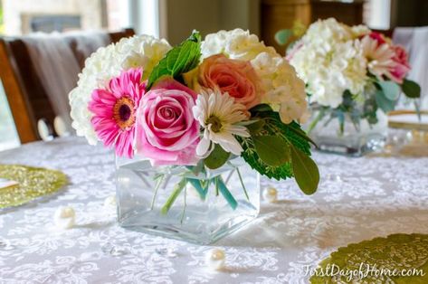 Bridal shower floral centerpieces with hydrangeas, gerber daisies, and roses. #bridalshower #bridalshowertable #floraltablearrangements #bridalshowerdecor Diy Bridal Shower Centerpieces, Wedding Shower Tables, Bridal Shower Centerpieces Diy, Wedding Shower Centerpieces, Bridal Shower Chair, Non Floral Centerpieces, Bridal Shower Table Decorations, Diy Bridal Shower, Bridal Shower Decorations Diy