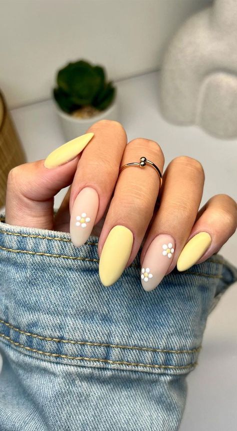 20. Matte Nude & Yellow Nails Nail art is a fun and creative way to express your style. Spring is the perfect time to... Coloured French Tips With Flowers, Nail Inspo Yellow Pastel, Yellow Matte Nails Design, Nude Daisy Nails, Matt Summer Nails, Fun Yellow Nails, Summer Nails Yellow Pastel, Yellow And Nude Nails, Yellow Nails Inspiration