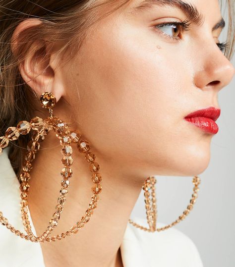 9 Outdated Jewelry Trends—and What to Buy Instead | Who What Wear Rajput Architecture, 2022 Earrings, Spring Jewelry Trends, Oversized Earrings, Big Jewelry, Spring Jewelry, Tiny Earrings, Swarovski Crystal Earrings, Sea Glass Jewelry