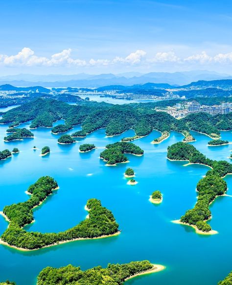 🌊 #ThousandIslandLake 🌅 Immerse yourself in the natural splendor of Thousand Island Lake in Hangzhou, China, where countless islets dot the serene waters, creating a picturesque landscape. Picturesque Landscape, Thousand Island, Hangzhou China, Island Lake, Thousand Islands, Lake Pictures, Small Island, Hangzhou, Lake