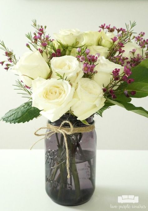 Sponsored. How to make DIY mason jar flower arrangements. These simple tried-and-true tricks will help you create lovely floral arrangements at home. Flowers Arrangements Simple, Jar Flower Arrangements, Purple Couches, Farmhouse Florals, Engagement Flowers, Mason Jar Flower Arrangements, Flowers Centerpieces, Floral Diy, Diy Hanging Shelves