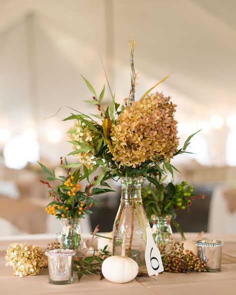 24 Dried Flower Arrangements That Are Perfect for a Fall Wedding #FallWedding #FallWeddingIdeas #FallWeddingColors #WeddingInspiration | Martha Stewart Weddings Dried Hydrangeas Centerpiece, Hydrangea Centerpiece Wedding, Cheap Wedding Table Centerpieces, Fresh Wedding Flowers, Fall Hydrangea, Hydrangea Centerpiece, Dried Hydrangeas, Hydrangeas Wedding, Fall Wedding Flowers