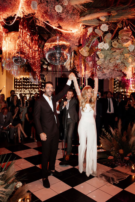 Retro Inspired Maximalist Wedding Ceremony #retromaximalist #maximalistwedding #discowedding #neonwedding #retrowedding Wedding With Couches, Cool Wedding Themes, Maxamilist Wedding, Retro Eclectic Wedding, 2026 Wedding Trends, Vintage Wedding Vibes, Wedding Theme Ideas Unique, Retro Wedding Reception, Retro Wedding Aesthetic