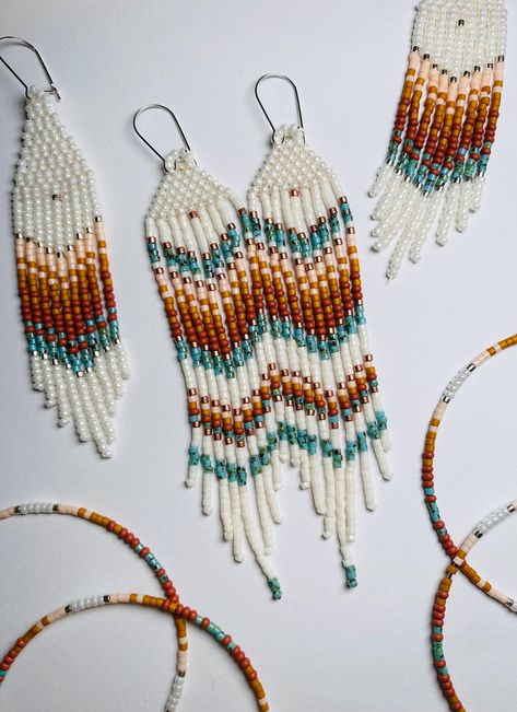 Handmade Boho Fringe Earrings made by Artisan Betty Conant one seed bead at a time.  These beaded Fringe Earrings hang about 4" long and sway beautifully. Sterling silver ear hooks Inspired by Native American Design. Native Seed Bead Earrings, Native Beaded Earrings Patterns, Seed Bead Earrings Ideas, Fringe Beaded Earrings Pattern, Native Beading Patterns Design, Fall Beaded Earrings, Seed Bead Earrings Diy, Seed Bead Earring Patterns, Seed Bead Jewelry Ideas