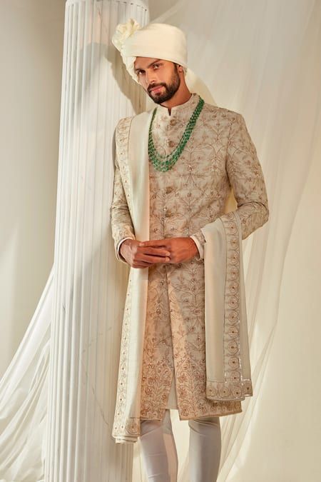 Buy Ivory Raw Silk Embroidered Dabka Botanical Pattern Sherwani Set For Men by Rachit Khanna Online at Aza Fashions. Ivory Sherwani Grooms, Wedding Sherwani For Groom Latest, Indian Men Wedding Outfit, Rachit Khanna, Sherwani Groom Wedding, Groom Sherwani, Men's Wedding Outfit, Sherwani Groom, Sherwani For Men Wedding