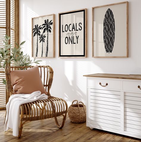 Elevate your space with our Beach Print Set a trio of surfboard, palm trees, and Locals Only sign prints in chic beige and black. Bring coastal vibes to your home decor effortlessly. Perfect for surf enthusiasts and beach lovers. Many More Coastal Gallery Wall Sets available in my shop! https://etsy.me/3MPbvav THIS IS A DIGITAL DOWNLOAD, NO PHYSICAL PRODUCT WILL BE SHIPPED  You will receive a PDF with a link to Google Drive containing 5 high resolution JPG files at 300 DPI that can be printed at Coastal Boho Art, Black Coastal Decor, Hawaii Apartment, Coastal Mid Century Modern, Hanging Pictures On The Wall, Colorful Beach House, Vintage Beach Decor, Coastal Gallery Wall, Surfboard Print