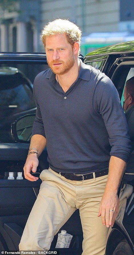 Harry and Meghan leave Carlyle Hotel for day two of their three-day New York City tour  | Daily Mail Online Harlem Restaurants, Mahalia Jackson, Prince Harry Photos, Prinz Harry, Beige Chinos, Navy Polo Shirt, Principe Harry, Poses For Photos, Prince Harry And Meghan