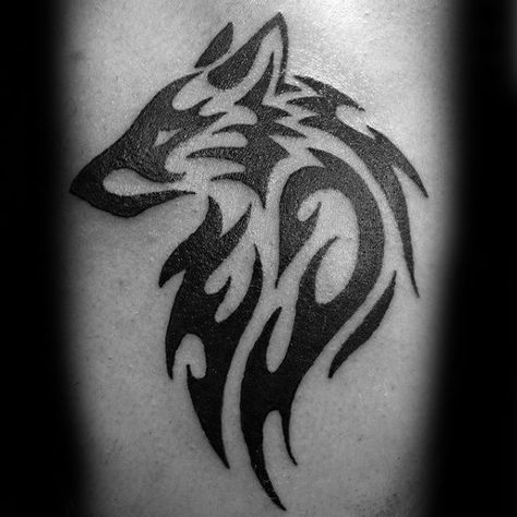 Top 43 Tribal Wolf Tattoo Ideas [2020 Inspiration Guide] Two Wolf Tattoo Design, Wolf Mens Tattoo, Men Tattoo Wolf, Wolf Themed Tattoos, Teen Wolf Tattoo, Simple Wolf Tattoo, Wolf Trible Tattoos, Back Tattoos For Guys Upper, Wolf Tattoo Forearm