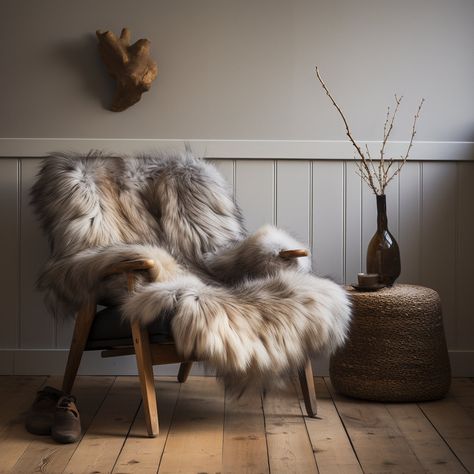 Transform your living space with the unparalleled beauty and warmth of our Icelandic Natural Sheepskin. Sourced from the pristine landscapes of Iceland, these genuine sheepskins are a luxurious addition to any home. 🌿 Ethically Sourced: Our sheepskins are ethically sourced, ensuring the highest standards of animal welfare. The sheep are raised in the idyllic Icelandic countryside, where they roam freely and graze on natural vegetation. 🌟 Luxurious Comfort: Indulge in the softness and comfort of our Icelandic sheepskin. The long, dense wool provides a plush and inviting texture, creating a cozy atmosphere in your home. Whether draped over a chair, sofa, or used as a rug, it adds a touch of opulence to any space. 🎨 Natural Hues: The natural hues of Icelandic sheepskins vary, ranging from Sheepskin Rugs, Sheepskin Living Room, Fur Home Decor, Icelandic Home Interior, Nordic Chalet, Icelandic Decor, Icelandic Interior Design, Classy Cabin Decor, Fur Rug Decor