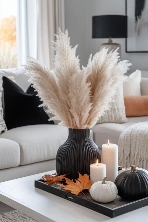 Transform your home into a cozy autumn haven with my fall decor guide! Find fall decor ideas and lighting suggestions for your living room, bedroom, entryway, and more. Use these fall decorating tips to help set the perfect fall ambiance. Learn how to easily refresh your spaces for the season and style your tables with stunning tablescapes and fall trays. Don't forget the porch—extend the autumnal vibes outdoors with welcoming fall home decor! RealEstateSpice.com #FallDecor Black Vase Decor, Halloween Entryway Decor, Fall Ambiance, Halloween Entryway, Fall Tray, Entryway Decor Ideas, Minimalist Halloween, Cozy Fall Decor, Black Vase