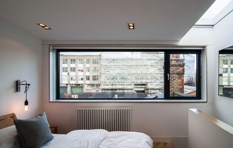 Large horizontal bedroom window and roof light with minimal artificial lighting in the converted loft bedroom. Loft Conversion Windows, Dormer Loft Conversion, Loft Windows, Window Lights, Loft Conversions, London Fields, Wooden Terrace, Small Home Offices, Loft Room