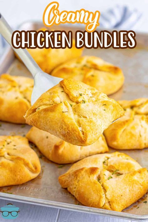 A serving spatula holding a Chicken Bundle above a platter of them. Mediterranean Slaw, Chicken Squares, Crescent Chicken, Chicken Croissant, Chicken Bundles, Recipes Using Crescent Rolls, Chicken Pockets, Chicken Crescent Rolls, Chicken Crescent