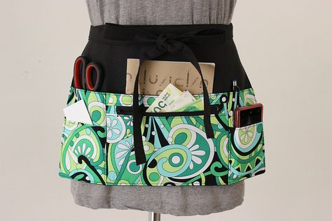 Servers should have original half aprons like this: base is black with colorful (the business colors)  and lots of pockets, some with zipper. Perhaps a bit longer than this apron (como el que vimos en PaloAltoMarket) Gardening Aprons, Aprons Diy, Teachers Apron, Half Apron Patterns, Vendor Apron, Half Aprons, Waitress Apron, Teacher Apron, Utility Apron