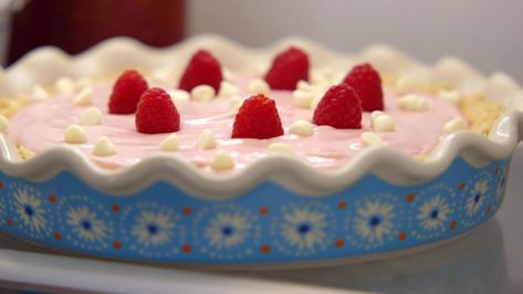 White Chocolate Raspberry Cheesecake Recipe | Ree Drummond | Food Network White Chocolate Rasberry Cheesecake, Chocolate Orange Martini, Raspberry Cheesecake Cake, Orange Martini, Milk Chocolate Mousse, Raspberry Cheesecake Bites, Raspberry Cheesecake Cookies, Shades Of Chocolate, Homemade Oreo Cookies