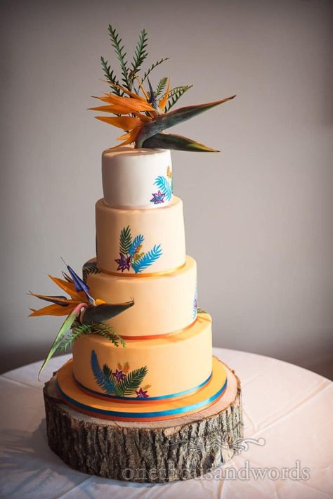 Four tiered wedding cake decorated with birds of paradise flowers #rnliwedding #weddingcake #dorsetwedding Macaroon Wedding Cakes, Luau Wedding, Tropical Wedding Cake, College Wedding, Paradise Flowers, National Margarita Day, Hawaiian Wedding, Painted Cakes, Take The Cake