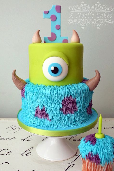 Monster Inc. cake by K Noelle Cakes Sully Birthday Cake, Diy Monsters Inc Cake, Monsters Ink 1st Birthday, Scared Of The Month Monsters Inc, Monsters University Birthday Cake, Monster Inc Bday Party, Monsters Inc Boo Cake, Monsters Ink First Birthday, Monster Inc Party Ideas 2nd Birthday