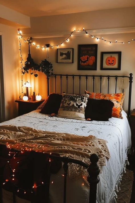 Cozy bedroom decorated with string lights and Halloween-themed decor. Loft Conversion Ideas Layout, Spooky Bedroom Decor, Halloween Home Decor Indoor, Halloween Themed Bedroom, Spooky Bedroom, Diy Halloween Home Decor, Halloween Bedroom Decor, Indoor Ideas, Fall Bedroom Decor