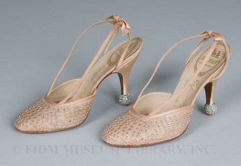 A pair of Delman evening shoes worn by Marlene Dietrich. As the label on the insole indicates, these shoes were made "Especially For Marlene Dietrich." It is believed these glittering heels were worn by Dietrich during one of her popular 1950s nightclub appearances. Silk Heels, 1950s Shoes, Vivier Shoes, Roger Vivier Shoes, Fashion 1950s, Marlene Dietrich, Old Shoes, Roger Vivier, Shoe Art