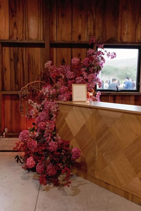 A Wedding in a Red Barn on the California Coast Flower Bar Ideas, Cocktail Hour Decor, Floral Bar, Decoration Buffet, Hotel Flowers, Pink Bar, Reception Tablescapes, Industrial Style Decor, Flower Installation