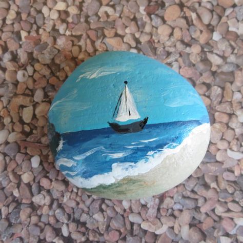 Sailboat Ocean Painted Pebble Rock Art Pebble Rock Art, Caillou Roche, Sugar Skull Painting, Stone Art Painting, Seashell Painting, Painted Rocks Craft, Painted Rocks Diy, Skull Painting, Rock Painting Ideas Easy