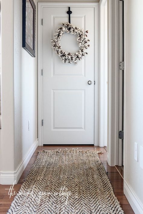 I finally upgraded the rug in our hallway… The little brown rug that we had in there the past few years was wore out. It had a few snags, the rubber backing was starting to peel from regular washing’s, and it had a couple of clorox stains by accident. It was time to upgrade.  I... Read more Farmhouse Rugs Entryway, Modern Farmhouse Hallway Runner, Farmhouse Hallway Runner Rugs, Bedroom Hallway Rug, Boho Runner Rug Hallway, Rug In Hallway, Entry Way Runner Rug Ideas, Large Entryway Rug Ideas, Front Door Runner Rug