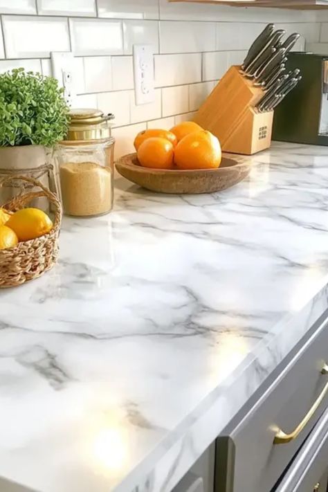 Transform your kitchen or bathroom countertops without breaking the bank using marble contact paper. This budget-friendly update is perfect for those looking to refresh their space on a tight budget. With a little time and patience, you can achieve a clean, chic look that rivals high-end countertops! Easily apply the contact paper for a quick and stunning change that suits different decor styles. Whether you're renting or just don’t want to commit to a remodel, this simple DIY technique can enhance your interiors dramatically. Diy Marble Contact Paper, Contact Paper Countertops, Paper Countertops, Contact Paper Countertop, Marble Contact Paper, Pan Seared Scallops, Delicious Seafood Recipes, New Countertops, Diy Marble