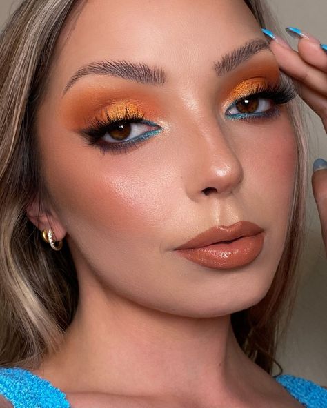 Orange Makeup Looks Blue Eyes, Orange And Gold Makeup, Colorful Bridal Makeup, Makeup Looks Orange, Colorful Wedding Makeup, Makeup Orange Dress, Blue And Orange Makeup, Blue And Orange Eye Makeup, Fun Orange Makeup