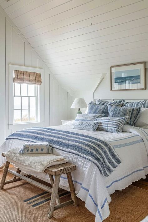 Create a serene and coastal retreat in your home with these 25 Charming Cape Cod Bedroom Ideas. Each idea captures the essence of this classic American style, blending nautical charm with cozy, understated elegance. Discover how to use light, airy color palettes, natural textures, and maritime accents to transform your bedroom into a peaceful Cape Cod haven. Whether it's through breezy linens, weathered wood furniture, or seaside-inspired decor! Coastal Granddaughter Interior, Room Decor Bedroom Beach, East Coast Bedroom, Blue Cottage Bedroom, Beach Bedroom Ideas Coastal Style, Coastal Contemporary Bedroom, Coastal Blue Bedroom, Nantucket Bedroom, Nantucket Interior Design