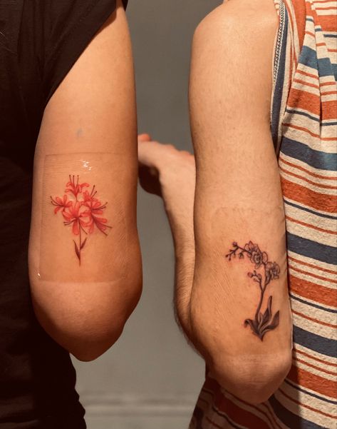 Red spider Lilly & Orchid Sister Tattoos Flower, Aesthetic Sister Tattoos, Siblings Tattoos, Sibling Tattoos, Favorite Flower, Sister Tattoos, Leaf Tattoos, Flower Tattoos, Maple Leaf Tattoo