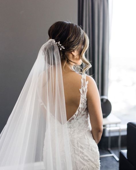 Spring Wedding Hairstyles 2024 Looks [Guide & FAQs] Wedding Hairstyles With Veil Underneath, Sleek Wedding Updo With Veil, Wedding Hair Low Updo With Veil, Low Bun Wedding Hair Veil, Veil Above Bun, Loose Bridal Updo With Veil, Wedding Hairstyle Bun With Veil, Bride Hair Bun With Veil, Low Wedding Updo With Veil