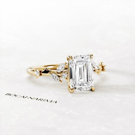 1.5 Carat Emerald Cut Lab Grown Diamond Nature Inspired Engagement Ring ⍟ The ring size shown in the pictures is 6 US. ★ Settings ☆ Metal - 14K / 18K Solid Gold / Platinum ☆ Gold Color - Rose / White / Yellow ★ Main Stone  ☆ Type - Lab Grown Diamond (CVD) ☆ Diamond Weight - 1.5 Carat ☆ Shape - Emerald ☆ Color - F+ ☆ Clarity - VVS2+ ☆ Polish/Symmetry - Ex/Ex ☆ Fluorescence - None ☆ IGI / GIA Certificate ★ Side Stones ☆ Type - Lab Grown Diamonds ☆ Total Carat Weight - approx 0.18 Carat ☆ Shape - R Emerald Cut Engagement Ring With Accents, Unique Emerald Cut Rings, Engagement Rings Side Stones, Unique Engagement Rings Emerald Cut, Emerald Cut Engagement Ring Moissanite, Nature Inspired Emerald Engagement Ring, Vintage Radiant Cut Engagement Ring, Gold Emerald Cut Rings Fine Jewelry, Emerald Engagement Ring With Side Stones