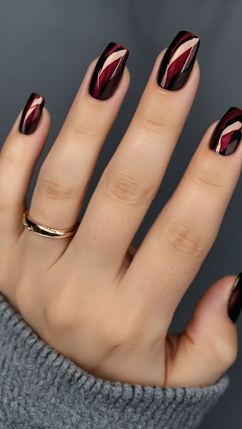 Get ready to embrace the season with stunning red fall nails that are perfect for any occasion Our latest blog post explores a variety of dark reds and vibrant shades offering design ideas that will make your nails stand out Discover creative acrylic designs featuring short nail art that combines red with striking black accents Whether you're looking for elegant inspirations or bold statements we've got you covered with color combinations that capture the essence of fall Tran Maroon Nails With Black Tips, Red And Black Magnetic Nails, Dark Red Nails With Black Design, Red And Black Fall Nails, Black With Red Chrome Nails, Black Maroon Nails, Vamp Red Nails, Black And Maroon Nail Designs, Black Nails With One Accent Nail