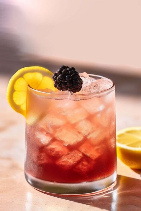 Shark Bite drink: blood in the water | Mix That Drink Bramble Recipe, Chinese Cocktail, Fruity Cocktail Recipes, Bramble Cocktail, Bbq Drinks, Lemon Juice Uses, New Years Cocktails, Fruity Cocktail, Gin Recipes