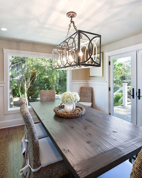 You can hang a chandelier at the standard height of 30 to 36 inches above the table, but there are a few more considerations to getting it just right. Farmhouse Dining Room Lighting, Dining Light Fixtures, Kitchen Table Lighting, Coastal Dining Room, Dining Room Remodel, Modern Farmhouse Dining, Table Lighting, Dining Room Light Fixtures, Elegant Dining Room