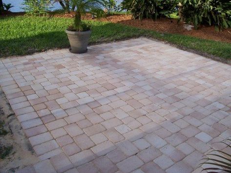 A simple paver patio can extend your existing concrete patio for a larger outdoor space. Outdoor Patio Pavers, Patio Blocks, Diy Patio Pavers, Paver Designs, Brick Patio, Patio Pavers Design, Cheap Patio, Garden Paving, Patio Style