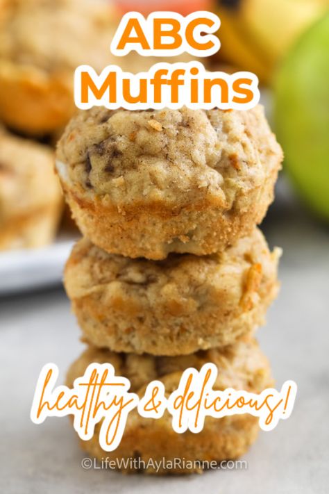 pile of ABC muffins with writing Apple Carrot Recipes Healthy, Healthy Apple Banana Muffins, Carrot And Apple Recipes, Apple Banana Carrot Muffins, Apple And Banana Muffins, Abc Muffins Toddler, Oatmeal Carrot Apple Muffins, Muffins For Toddlers Healthy, Toddler Apple Muffins