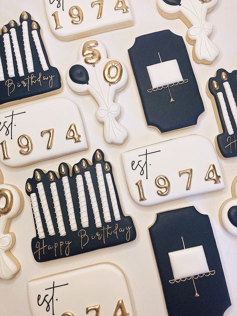 How beautiful are these black, white, and gold 50th birthday cookies! If you are interested in ordering a custom set of cookies for your next gathering or event, you can fill out an order form on my website or email me at grace@sugarcrumbsllc.com www.sugarcrumbsllc.com #bakery #smallbusiness #sugarcrumbsbakery #customcookies #50thbirthday Cheers To 30 Years Cookies, 50 Birthday Cookies Women, Black And Gold Cookies Decorated, Black And White Birthday Cookies, Winter Birthday Cookies, Golden Birthday Cookies Decorated, 50th Birthday Cookies Decorated, Royal Icing Cookies Birthday, 75th Birthday Cookies