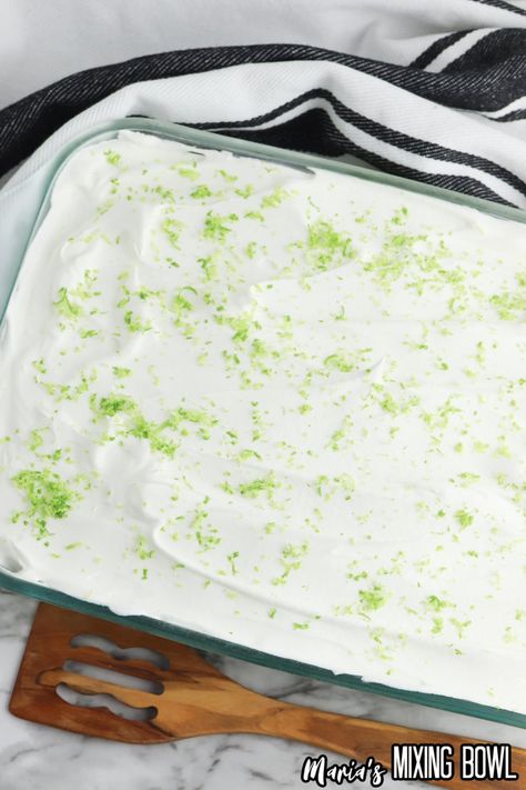 This Key Lime Poke Cake is a refreshing treat that is the perfect blend of sweet and tangy. It's a great dessert to make this summer. Key Lime Dump Cake, Key Lime Poke Cake, Key Lime Dessert Recipes, Lime Poke Cake, Cake Frosting Tips, Healthy Key Lime, Lime Dessert Recipes, Lime Cake Recipe, Key Lime Desserts