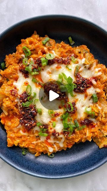 James Park | 제임쓰🇰🇷 on Instagram: "CHEESY, SAVORY OATMEAL❤️‍🔥⁣ ⁣ Upgrade your traditional oatmeal by adding scallions, kimchi, garlic, and more! There are TWO types of cheese too 🤭⁣ ⁣ It’s SO DELICIOUS and it will make you an OATMEAL person after the first bite✨⁣ ⁣ SAVE this post for this foolproof recipe📝⁣ ⁣ INGREDIENTS⁣ * 3 medium scallions, chopped⁣ * 1/2 medium yellow onion, chopped ⁣ * 1/2 cup drained Napa cabbage kimchi, chopped⁣ * 2 cloves garlic, minced⁣ * 1 tablespoon neutral oil⁣ * 1 teaspoon toasted sesame oil⁣ * 1/2 cup old-fashioned rolled oats⁣ * 1 cup water⁣ * 1 tablespoon soy sauce⁣ * 1 large egg⁣ * 1 tablespoon grated Parmesan cheese⁣ * 1/2 cup low-moisture shredded mozzarella cheese⁣ * Chili crisp, for garnish⁣ ⁣ 1. Heat the neutral oil and toasted sesame oil  in Rolled Oats Recipe, Cabbage Kimchi, Savory Oatmeal, Toasted Sesame Oil, Chili Crisp, Breakfast Inspiration, Oat Recipes Healthy, Gf Breakfast, Overnight Oats Recipe Healthy