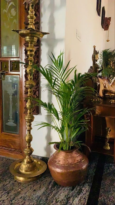 Brass Planters Ideas, Bengali Interior Design, Home Entrance Decor Indian, Tulasi Plant, Indian Inspired Decor, Vintage Brass Decor, Indian Room Decor, Tall Lamp, Drawing Room Decor