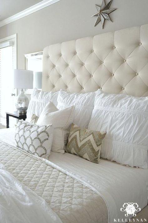 - Kelley Nan: Master Bedroom Update- Calming White and neutral master bedroom with tufted ottoman stools, Pottery Barn Tall Lorraine Headboard, Diamond linen quilt and hadley ruched duvetKelley Nan: Master Bedroom Update: Beautiful Bed Designs, Quilted Headboard, Bedroom Updates, Bedroom Master, Trendy Bedroom, Remodel Bedroom, Main Bedroom, White Bedroom, Beautiful Bedrooms