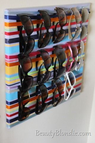 My sister-in-law gave me this square board with all different kinds of ribbons on it.  At first I didn’t know what to do with it and it took me a little while to decide.  Then, it finally came to m... Jewellery Stand, Sunglasses Display, Sunglasses Storage, Desain Quilling, Astuces Diy, Ribbon Wrap, Sunglass Holder, Jewelry Organizer, Cleaning Organizing