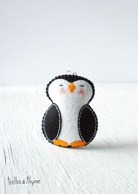 This listing is for an instant-download PDF-PATTERN. It is not a finished toy. Little Penguin loves to play in powdery snow, and jump from ice flow to ice flow. His favorite foods are candied herring and kippers. Hes full of wintry cheer, and brings smiles wherever he goes!  This felt pattern is stitched entirely by hand, and is perfect for beginners. Finished ornament is approximately 3.75 inches tall.  Skills required: - Basic embroidery skills - Blanket stitch - Back stitch - Stem stitch -... Diy Felt Christmas Ornaments, Felt Ornaments Patterns, Artsy Ideas, Softie Pattern, Penguin Ornaments, Felt Crafts Patterns, Holiday Sewing, Felt Crafts Christmas, Felt Creations