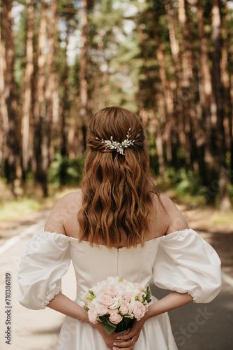 Stock Image: Stylish hairstyle for long hair Half Up Half Down Wedding Hair With Greenery, Bride Hair Vine Half Up, Wedding Hairstyles Flowers, Boho Wedding Hair Brunette Flowers, Cottagecore Bridal Hair, Large Forehead Hairstyles, Pearl And Flower Hair Vine, Wedding Hair Down, Hairstyle Look