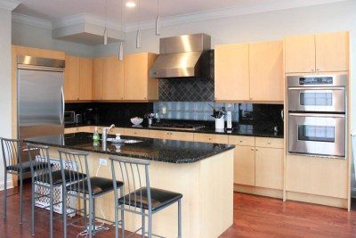 A Kitchen From The 2000s Is Remodeled | domino Updating Early 2000s Home, 2000s Kitchen Aesthetic, Early 2000s Kitchen, 2000s Kitchen, 2010 Kitchen, Home Gym Design Garage, 00s Style, Brick Decor, Modern Kitchen Cabinets