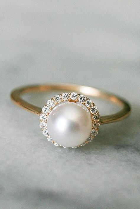 Pearl Engagement Rings For A Beautiful Romantic Look ❤️ pearl engagement rings halo rose gold ❤️ More on the blog: https://ohsoperfectproposal.com/pearl-engagement-rings/ Pearl Engagement Rings, Pearl Wedding Ring, Rose Gold Halo Engagement Ring, Pearl Engagement Ring, Beautiful Wedding Rings, Pearl And Diamond Ring, Wedding Rings Halo, Best Engagement Rings, Stunning Engagement Ring