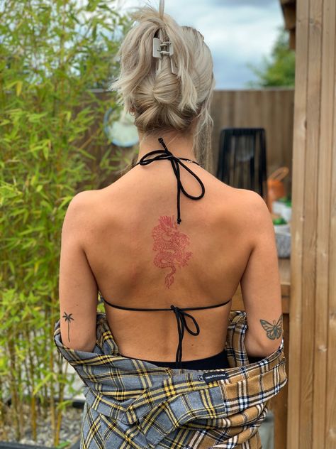 Red Ink Dragon Tattoo Back, Dragon Spine Tattoo For Women Dainty, Red Spinal Tattoo Women, Small Dragon Back Tattoo, Spine Tattoos Red Ink, Chinese Dragon Back Tattoo, Butterfly Patchwork Tattoo, Red Dragon Tattoo For Women, Red Dragon Tattoo Back