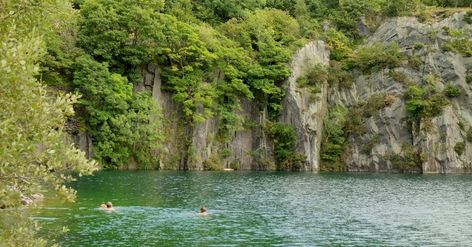 When you don't fancy swimming with the masses in a chlorinated pool, head to one of these wild swimming spots around the UK  and enjoy the cool waters of our rivers and lakes. Overgrown Ruins, Quarry Lake, Uk House, Wild Swimming, Swimming Tips, Pump House, Swimming Pond, Heavenly Places, Summer Activity