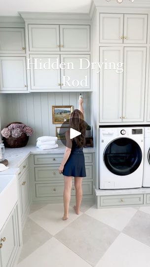 11K views · 18 reactions | We love our hidden drying rod!  It’s actually just a normal closet round rod that is hidden because that cabinet face goes 5” lower than the actual cabinet! 

I’ve seen so many good ideas on how to hang laundry in the laundry room!  Just sharing what we did!  And there will be someone that says that the shirt is small!  It is mine, not a child’s shirt!  I can hang any shirt, pants folded on a hanger and dresses folded over a hanger!  This space was never meant for a full length dress!

Paint~Farrow & Ball light blue cut by 50%

How do you hang your laundry?

✨To shop this space comment SHOP!  Or click the link in my bio and click on the LTK button and you can shop ALL my posts & reels!  https://liketk.it/4NiIv

•
•
•

#viralreel #laundryroom laundry room #laundry Narrow Laundry Room Ideas Top Loaders, Farrow Ball Light Blue, Hidden Laundry Rooms, Small Laundry Closet, Laundry Shoot, Laundry Craft Rooms, Custom Home Build, Laundry Chute, Laundry Room Ideas Small Space