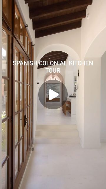 Spanish Kitchen Island, Plaster Vent Hood, Spanish Colonial Kitchen, Cove Ceiling, Brass Faucets, Spanish Kitchen, Colonial Kitchen, Marble Island, Spanish Mediterranean